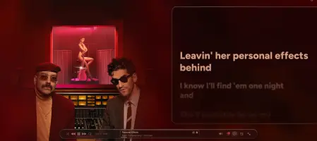 Cider in Immersive mode, with full-screen artwork and synced lyrics