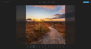 Shows an image being cropped in Windows 11, with the transparent original behind it.
