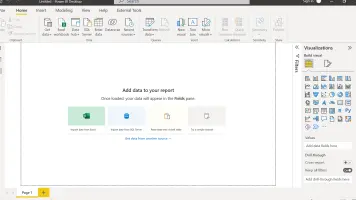 Screenshot of Power BI Desktop in Report view with a blank canvas.