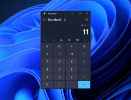 Calculator app in dark mode with new Windows 11 visuals.