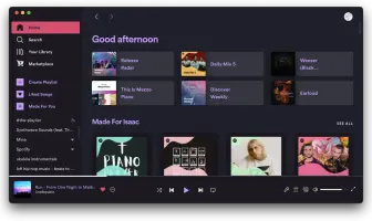 Spotify with Sleek Elementary theme — a minimal dark interface with warm orange accents